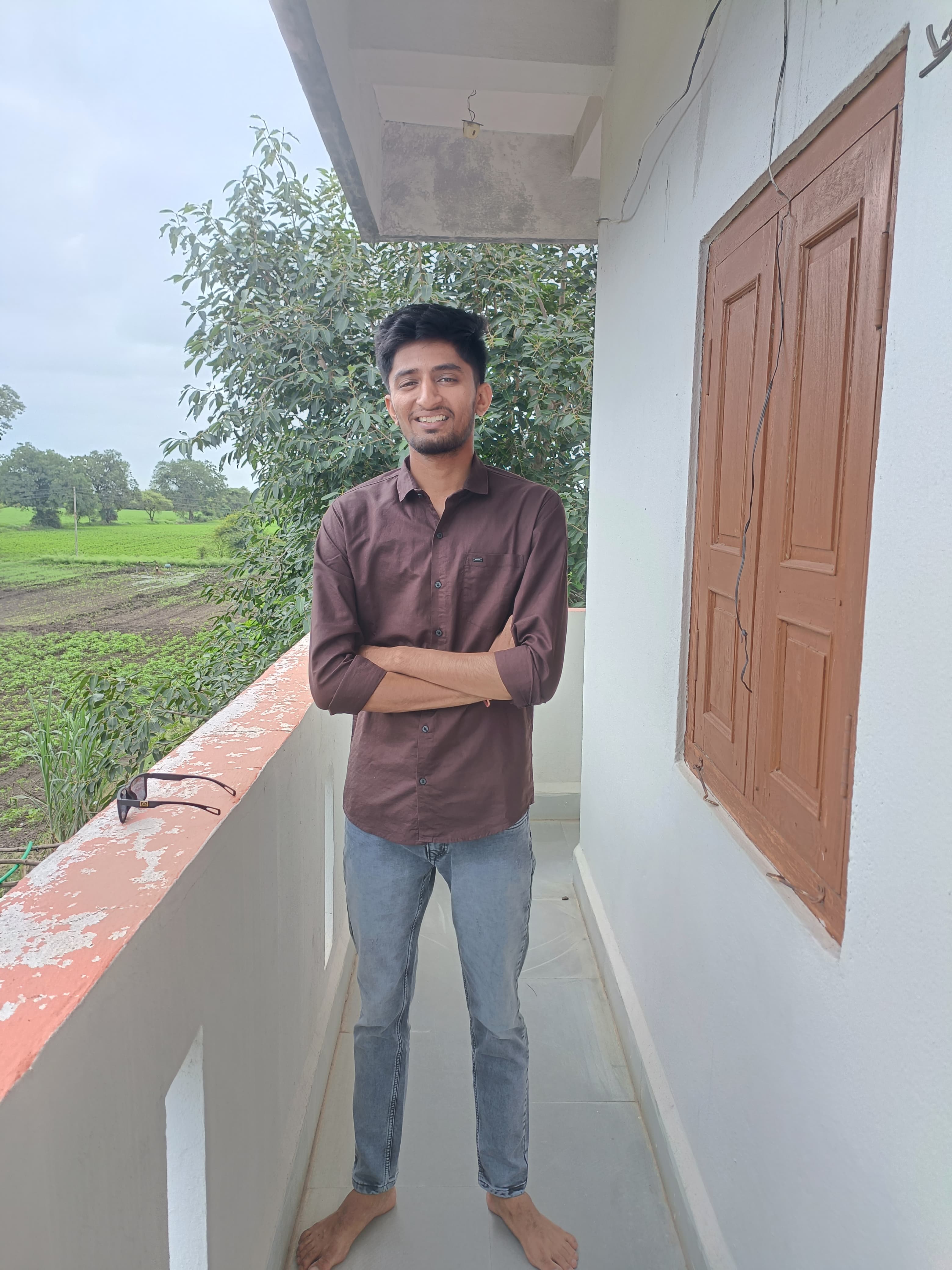 Reference photo of the user on a balcony